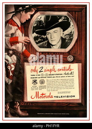 Vintage 1950's TV USA American press advertisement for a floor standing cabinet Motorola Television featuring young boy in cowboy outfit with holstered pistol and his favourite American cowboy star HOPALONG CASSIDY on television screen Stock Photo