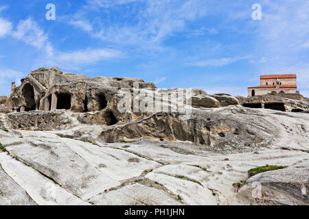 Cave city of Uplistsikhe with church in the background, in Georgia. Stock Photo