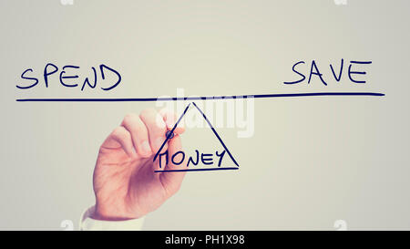 Conceptual retro image of whether to Spend or Save your Money with a man drawing a diagram of a seesaw on a virtual screen balancing the two concepts  Stock Photo