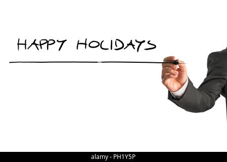 Man writing the words - Happy holidays - with a black marker pen from behind a virtual screen or interface on a light grey background with copyspace,  Stock Photo