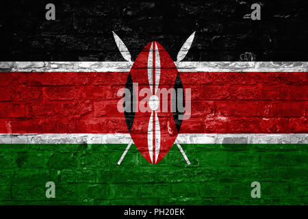Flag of Kenya over an old brick wall background, surface Stock Photo