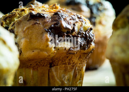 Closeup of delicious freshly baked banana chocolate muffin. Stock Photo