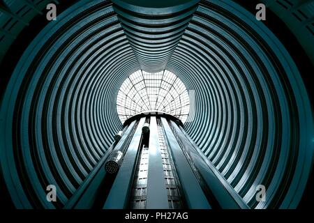 Singapore - April 10th 2018: Perspective view of the high atrium and elevator shaft at Holiday Inn Singapore Stock Photo