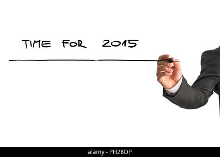 Businessman writing - Time for 2015 - with a black marker pen on a virtual screen over white with plenty of copyspace. Stock Photo