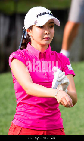 Jeongseon, east of Seoul, South Korea. 25th Aug, 2018. Shin-Ae Ahn (KOR) Golf : Shin-Ae Ahn of South Korea walks off her tee shot as she uses a sunscreen on the 13th hole during the second round of KLPGA High1 Resort Ladies Open 2018 at the High1 Country Club in Jeongseon, east of Seoul, South Korea . Credit: Lee Jae-Won/AFLO/Alamy Live News Stock Photo