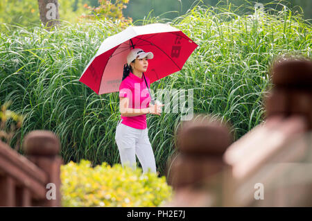 Jeongseon, east of Seoul, South Korea. 25th Aug, 2018. Shin-Ae Ahn (KOR) Golf : Shin-Ae Ahn of South Korea walks on the 16th fairway during the second round of KLPGA High1 Resort Ladies Open 2018 at the High1 Country Club in Jeongseon, east of Seoul, South Korea . Credit: Lee Jae-Won/AFLO/Alamy Live News Stock Photo