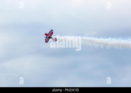 Bournemouth, UK. 30th August 2018. Up to a million people are set to descend on Bournemouth over the next four days as the 11th annual Bournemouth Air Festival gets underway. Lovely sunny day for the start of the festival. A first for Bournemouth Air Festival, pilot Rich Goodwin showcases the Muscle Biplane Pitts SaS G-EWIZ Super Pitts S2S (G-EWIZ) Muscle biplane combining aerial manoeuvres and high energy muscle biplane aerobatics - a special treat in the morning for the opening, ahead of the advertised schedule for the afternoon flying. Credit: Carolyn Jenkins/Alamy Live News Stock Photo