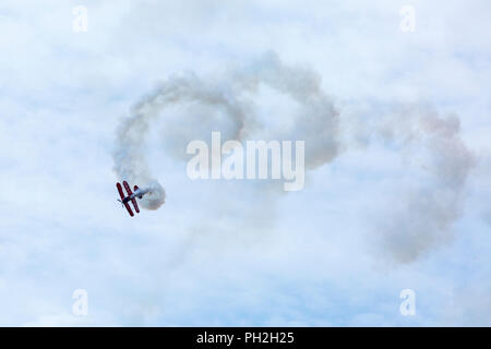 Bournemouth, UK. 30th August 2018. Up to a million people are set to descend on Bournemouth over the next four days as the 11th annual Bournemouth Air Festival gets underway. Lovely sunny day for the start of the festival.  A first for Bournemouth Air Festival, pilot Rich Goodwin showcases the Muscle Biplane Pitts SaS G-EWIZ Super Pitts S2S (G-EWIZ) Muscle biplane combining aerial manoeuvres and high energy muscle biplane aerobatics - a special treat in the morning for the opening, ahead of the advertised schedule for the afternoon flying. Credit: Carolyn Jenkins/Alamy Live News Stock Photo