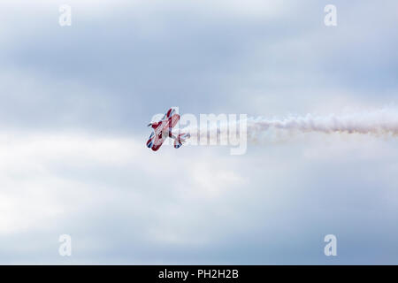 Bournemouth, UK. 30th August 2018. Up to a million people are set to descend on Bournemouth over the next four days as the 11th annual Bournemouth Air Festival gets underway. Lovely sunny day for the start of the festival.  A first for Bournemouth Air Festival, pilot Rich Goodwin showcases the Muscle Biplane Pitts SaS G-EWIZ Super Pitts S2S (G-EWIZ) Muscle biplane combining aerial manoeuvres and high energy muscle biplane aerobatics - a special treat in the morning for the opening, ahead of the advertised schedule for the afternoon flying. Credit: Carolyn Jenkins/Alamy Live News Stock Photo