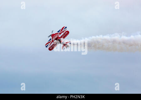 Bournemouth, UK. 30th August 2018. Up to a million people are set to descend on Bournemouth over the next four days as the 11th annual Bournemouth Air Festival gets underway. Perfect weather for flying. A first for Bournemouth Air Festival, pilot Rich Goodwin showcases the Muscle Biplane Pitts SaS G-EWIZ Super Pitts S2S (G-EWIZ) Muscle biplane combining aerial manoeuvres and high energy muscle biplane. Credit: Carolyn Jenkins/Alamy Live News Stock Photo