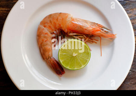 Raw big shrimp on the plate Stock Photo