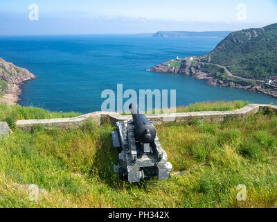 Old cannon pointing towards Atlantic ocean on Signal Hill in St. John's, Newfoundland, Canada Stock Photo