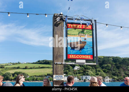 Colourful sign for the Ferry Inn waterfront pub in the pretty Devon sailing town of Salcombe Stock Photo