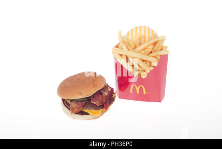 McDonald's Bacon McDouble cheeseburger with a medium french fries Stock Photo