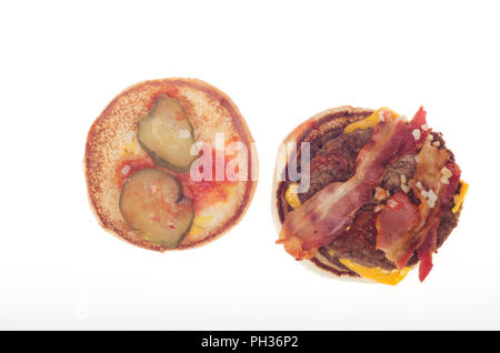 McDonalds Bacon McDouble Cheeseburger open showing bacon, burgers, pickles, onions,  ketchup and cheese Stock Photo