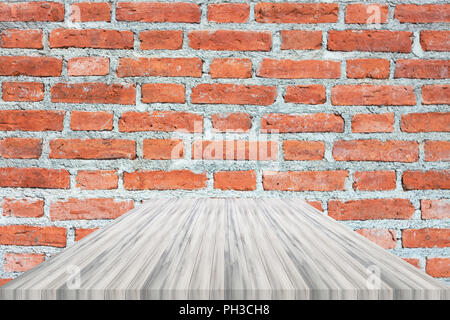 White table top on brick wall. For product display Stock Photo