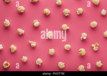 popcorn on a pink background Stock Photo