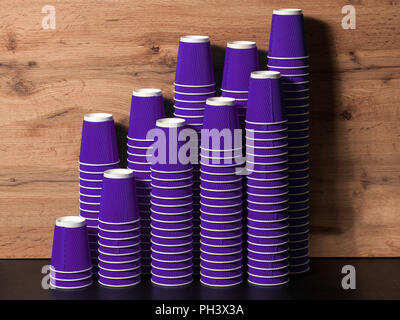purple disposable paper cups on wooden background Stock Photo
