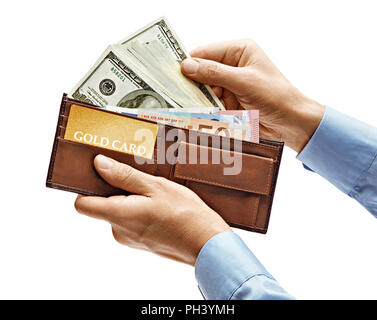 Men's hands in shirt holding full purse of money isolated on white background. High resolution product. Close up Stock Photo