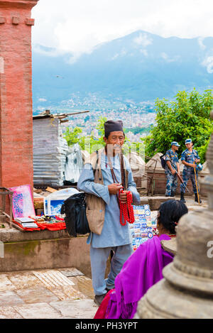 Kathmandu, Nepal - July 15, 2018 : Local vendors at the Monkey temple Swayambhunath Stupa complex Stock Photo