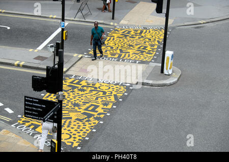 'Colourful Crossings' pop art installation zebra crossing near Beech Street Tunnel & Barbican Station, Culture Mile,  City of London UK KATHY DEWITT Stock Photo