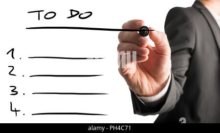 Close up of the hand of a businessman drawing up a to do list with a black marker on a white virtual interface with annotated numbers and blank lines  Stock Photo