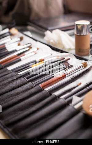 Makeup brushes in organizer. Brushes for face visage. Professional tools for makeup. Stock Photo