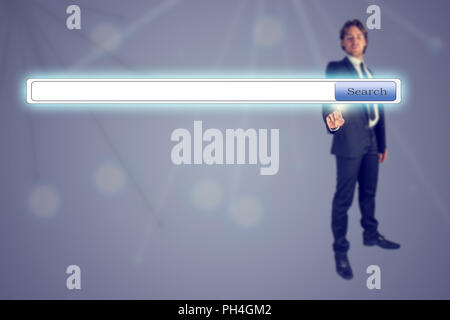 Businessman pressing Search engine button, conceptual of internet, searching system and technology. Stock Photo