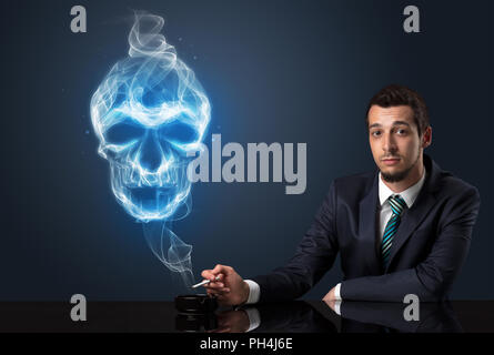 Businessman smoking with skull simbol above his head. Stock Photo