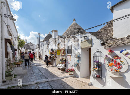 View of the typical Trulli huts and the alleys of the old village of Alberobello. Province of Bari, Apulia, Italy, Europe. Stock Photo