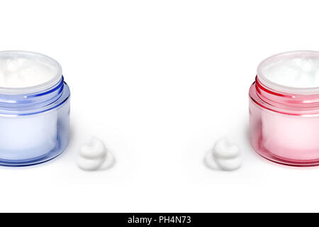 Two containers of moisturizing face cream on white background. Fashion woman still life. Pop female things, medicine and cosmetic theme. Copy space for text Stock Photo