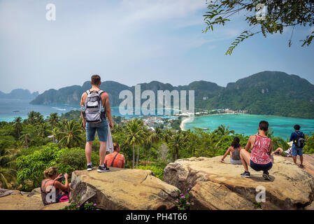 Tourists enjoy panoramic view over Koh Phi Phi Island in Thailand Stock Photo