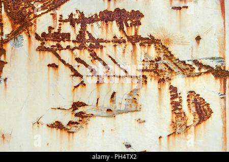 White painted metal surface with scratches and patches of rust Stock Photo