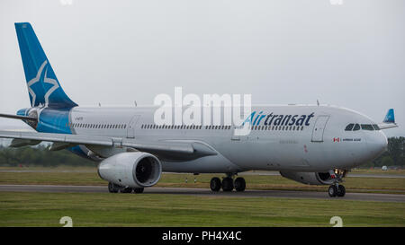 Air Transat flight across the pond departs Glasgow International Airport, Renfrewshire, Scotland - 14th June 2018 Stock Photo