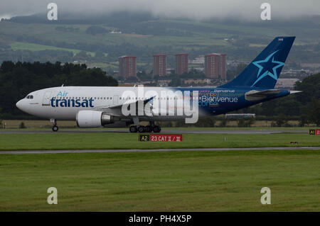 Air Transat flight across the pond departs Glasgow International Airport, Renfrewshire, Scotland - 28th August 2017 Stock Photo