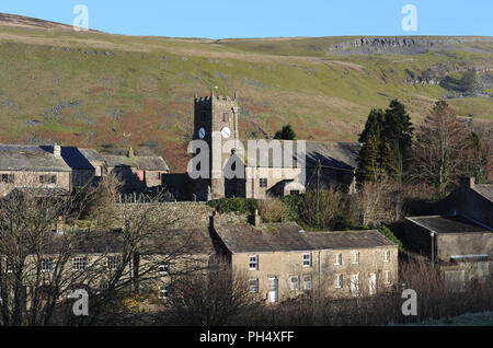 St Mary's Church in the village of Muker, Swaledale, Yorkshire Dales, Britain. The church tower clock reads 10.20 Stock Photo