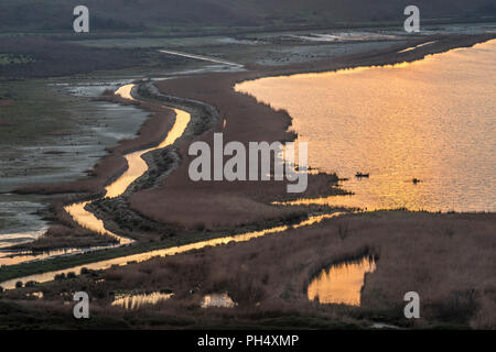 Sunset across the Vrina plain wetlands at Butrint National Park,  Butrint, Southern Albania. Stock Photo