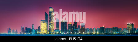 Panorama view of Abu Dhabi Skyline at sunset, UAE Stock Photo