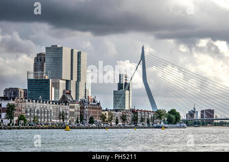 Rotterdam, The Netherlands, August 13, 2018: view of Noordereiland, Erasmusbridge and Kop van Zuid from a boat on the river Nieuwe Maas Stock Photo