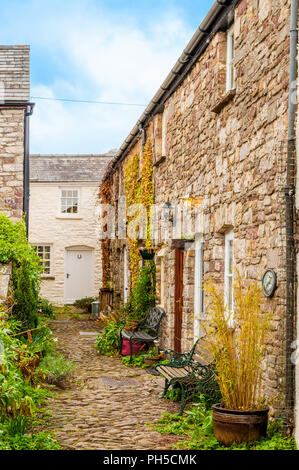 A row of stone terraced cottages in a village Stock Photo