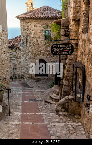 Narrow cobbled streets and old stone buildings in the village of Eze on the Cote d'Azur in the South of France Stock Photo