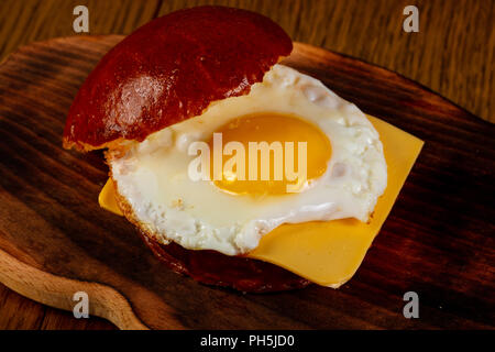 Burger with egg and cheese Stock Photo