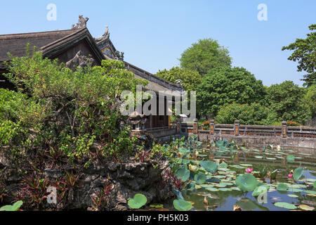 Lotus pool and Truong Du Pavilion, Dien Tho Palace, Imperial City, Hue, Viet Nam Stock Photo