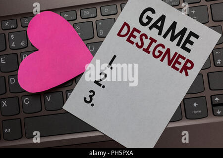 Handwriting text Game Designer. Concept meaning Campaigner Pixel Scripting Programmers Consoles 3D Graphics Paper Romantic lovely message Heart Keyboa Stock Photo
