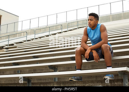 Young African Amerian teenage athlete thinking about his future. Stock Photo