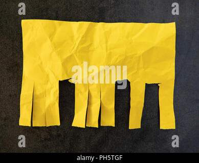 Blank yellow paper with tear off tabs Stock Photo