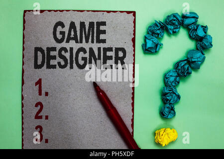 Handwriting text writing Game Designer. Concept meaning Campaigner Pixel Scripting Programmers Consoles 3D Graphics Gray paper marker crumpled papers  Stock Photo