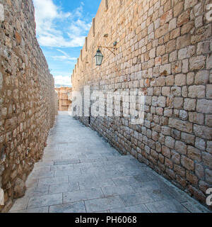 Street and old houses walls in the Old Town in Dubrovnik, Croatia Stock Photo