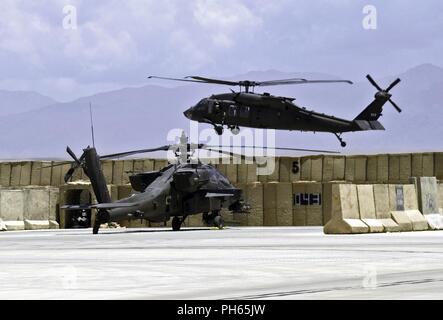 A U.S. Army UH-60 Blackhawk helicopter assigned to Task Force Shadow lands at Camp Dahlke, Afghanistan June 23. Stock Photo