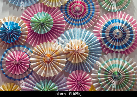 Cupcakes background. Colorful objects close-up. Umbrellas for the cocktails background Bright colorful background Stock Photo